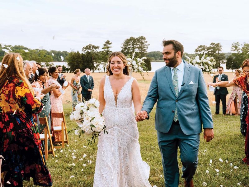 Bride and groom walking.