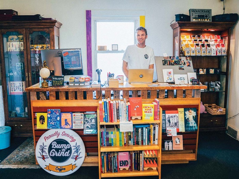 a counter selling books and coffee