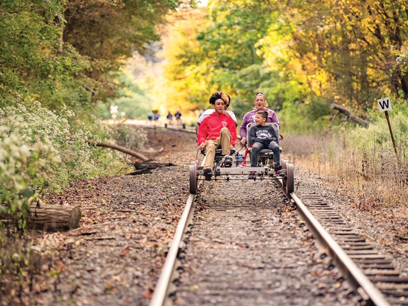 a family on a railbike