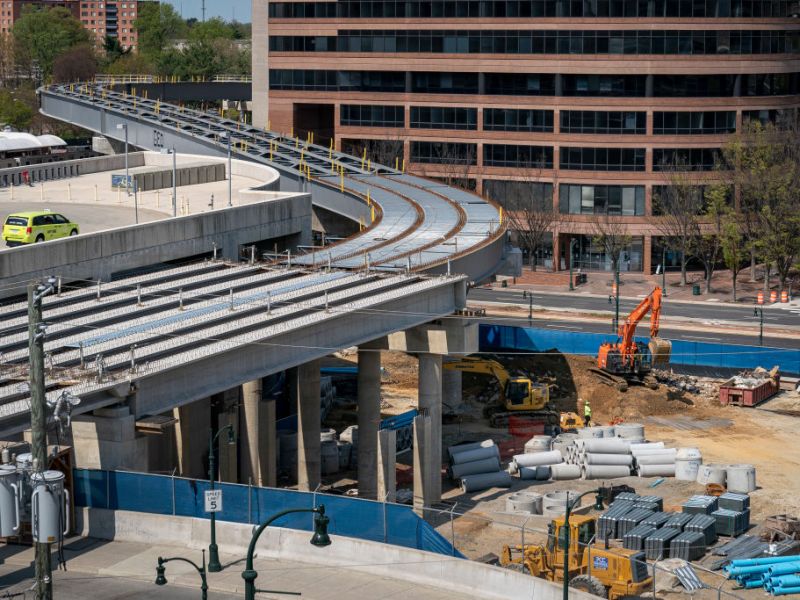 a raised track under construction in a city