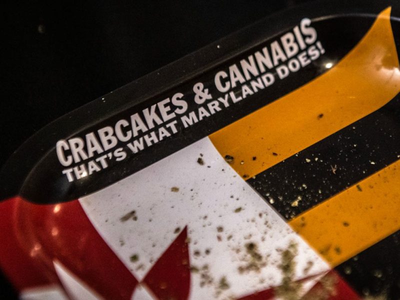 a plate saying "crabcakes and cannabis, that's what maryland does"