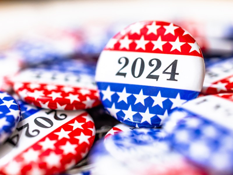 Closeup of new election vote button with text that says 2024