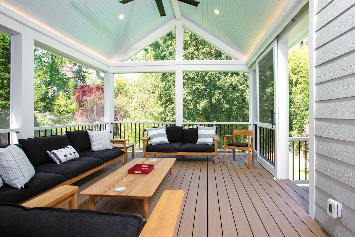 A roomy screened porch serves as a lounge area for the Rissmiller family of Chevy Chase.