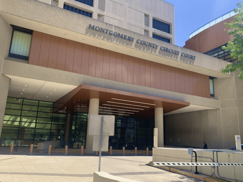 Tan building labeled Montgomery Country Circuit Court